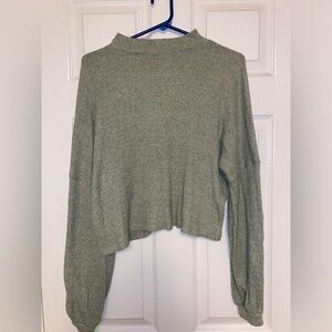 Green, cropped, turtle neck sweater. Size large. Barely worn.